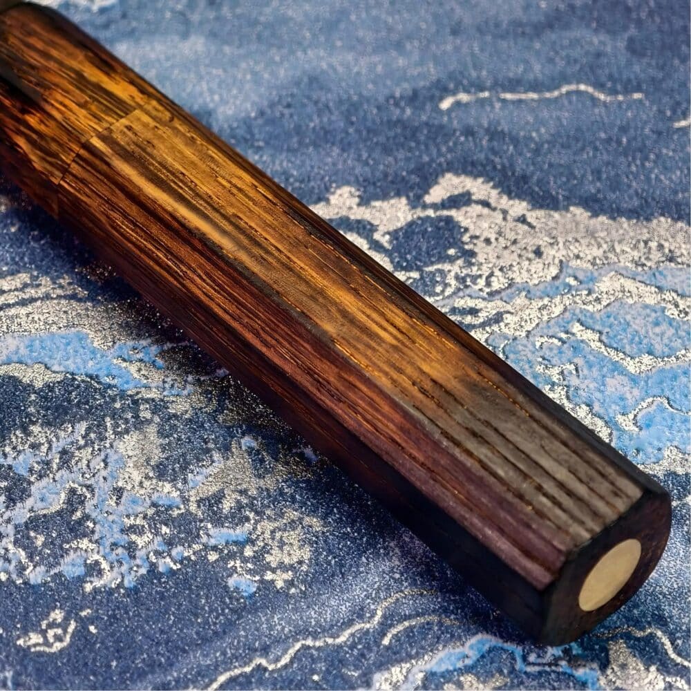 ODIN’s dark oak handle