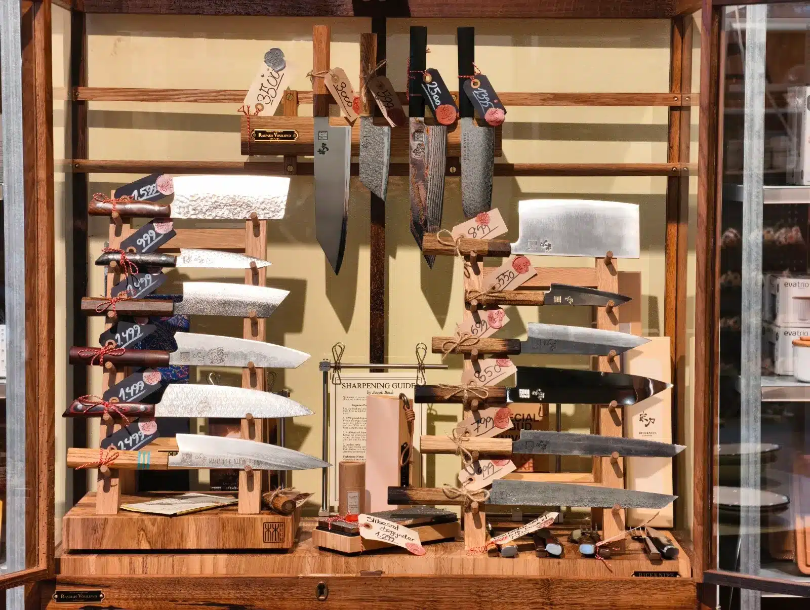 RICEKNIFE knives in a wood and glass display case built by Rasmus Voulund, at Bahne Frederiksberg